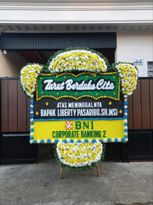 Papan Bunga Duka di Rawamerta