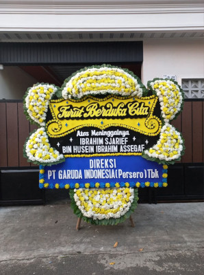 Papan Bunga Duka di Rawamerta